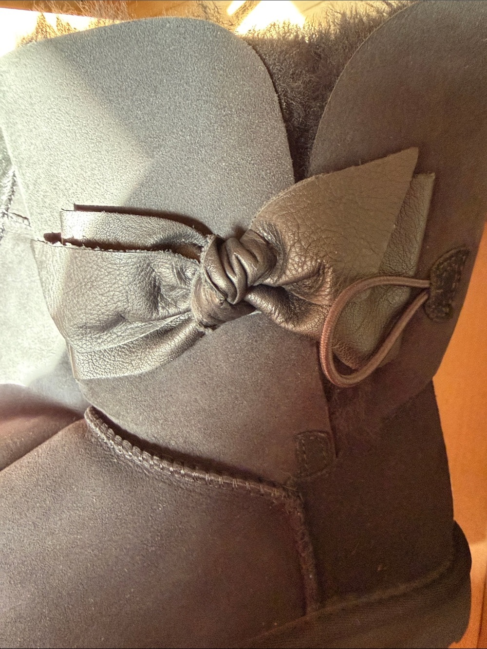 UGG Daelynn Black Bow-Accent Shearling Short Boots - Picture 15 of 17
